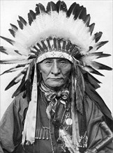A Native American chief wearing his headdress. Artist: Unknown