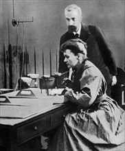 Pierre and Marie Curie in their laboratory, 1898 (1951). Artist: Unknown