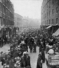 Sunday market, Wentworth Street, East London, c1930s. Artist: Unknown