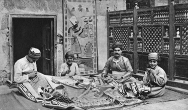 Craftsmen, tentmakers' bazaar, Cairo, Egypt, c1922.Artist: Donald McLeish