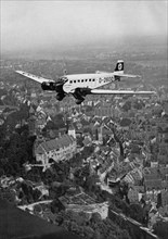 Junkers Ju 52 aircraft D-2600 over Nuremberg, Germany, 1934. Artist: Unknown
