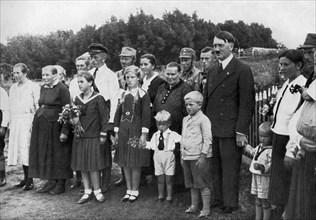 Adolf Hitler visiting a farming family in East Prussia, Germany, 1936. Artist: Unknown