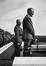 Adolf Hitler with Konstantin Hierl, Nuremberg Rally, Germeny, 1935. Artist: Unknown