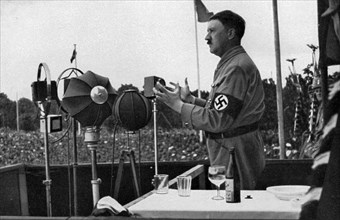 Adolf Hitler addressing the German people at the Nuremberg Rally, Germany, 1935. Artist: Unknown