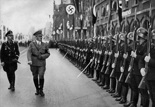 Adolf Hitler reviewing Leibstandarte troops at the Nuremberg Rally, Germany, 1935. Artist: Unknown