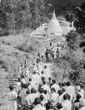 Procession to a Buddhist temple, Diyatalawa, Ceylon, c1945. Artist: Unknown