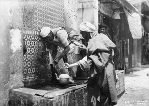 People collecting water from a well, Rabat, Morocco, c1920s-c1930s(?). Artist: Unknown