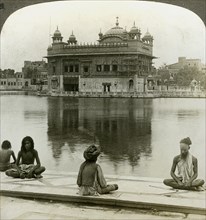 Fakirs at Amritsar, looking south across the Sacred Tank to the Golden Temple, India, c1900s(?)Artist: Underwood & Underwood