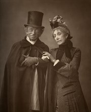 American actors James Lewis and Ann Gilbert in 'A Night Off', 1886. Artist: Barraud