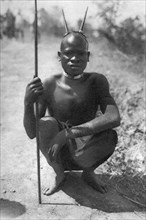 A boy with 'horns', Abercorn to Tukuyu, Tanganyika, 1925 (1927). Artist: Thomas A Glover