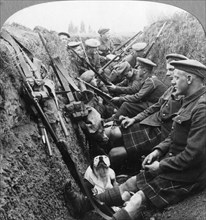 A section of Seaforth Highlanders snatching a moments respite, World War I, c1914-c1918. Artist: Realistic Travels Publishers