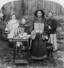 'A genial official of interior China, naval mandarin, Kinkow' (Jingzhou), China, 1900. Artist: Underwood & Underwood