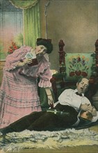 A postcard of a wife taking her drunk husband's money. Artist: Unknown