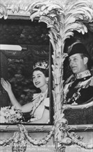 Queen Elizabeth II and Duke of Edinburgh in the State Coach, The Coronation, 2nd June 1953. Artist: Unknown