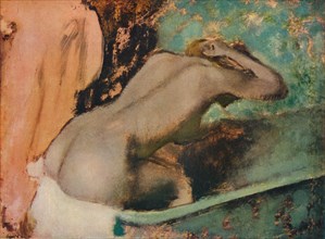 Femme assise sur le bord d'une baignoire et s'epongeant le cou, c1880, (1936). Artist: Edgar Degas