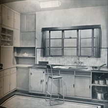 Section of a small kitchen, designed by Mrs Darcy Braddell, 1935.  Artist: Unknown.