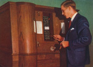 Slot machine that plays bridge, 1938. Artist: Unknown.