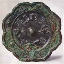 'Bronze Mirror: T'Ang Dynasty', (618-907). Artist: Unknown.