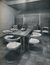'A dining-room suite, with table and chairs of steel tube. By Practical Equipment Ltd., of London',  Artist: Unknown.