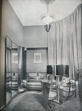'Part of a boudoir dressing-room in dove grey satin and chromium plated metal, by Eugene Printz of P Artist: Unknown.