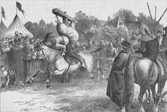 English merry-making in the 14th century: tilting at the quintain, 1905.  Artist: Unknown.