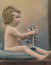 Child with toy, c1920. Artist: Unknown.