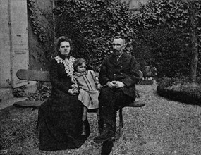 'M. and Mme Curie in the garden of their Paris house', c1902, (1903). Artist: Paris Ellis.