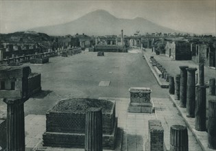 View of the forum with Mount Vesuvius in the distance, Pompeii, Italy, 1927. Creator: Eugen Poppel.