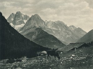 View of the Brenta Group with alpine pasture, Madonna di Campiglio, Dolomites, Italy, 1927. Artist: Eugen Poppel.