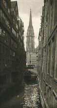 'Hamburg - Fleet with St. Nikolai Tower', 1931. Artist: Kurt Hielscher.