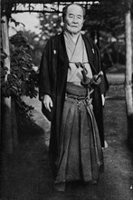 'Viscount Shibusawa, (1840-1931) wearing his samurai swords', c1900, (1921). Artist: Julian Leonard Street.