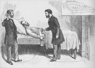 'Alexander Graham Bell and assistant use an electrical detector to find a bullet in the torso of ail Artist: W Shinkle.