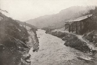 'Pirahy Diversion: View down-stream from outlet of tunnel'. 1914.  Artist: Unknown.