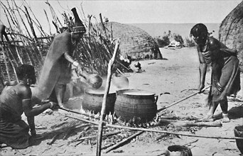 Zulu wives brewing utshwala (beer), Natal, 1912. Artist: Unknown.