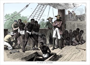 Captives being brought on board a slave ship on the West Coast of Africa (Slave Coast), c1880. Artist: Unknown.