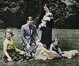 Royal family as a happy group of dog lovers, 1937. Artist: Michael Chance.