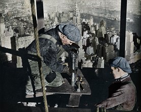'Rivetting the last bolts on The Morning Mast of the Empire State building', c1931. Artist: Lewis Wickes Hine.