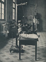 'Crookes, Rontgen and Finsen - Using the Marvellous X-Rays Apparatus', c1925. Artist: Unknown.