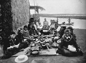 A native feast in Hawaii, showing the characteristic vessels, 1902. Artist: William H Rau.