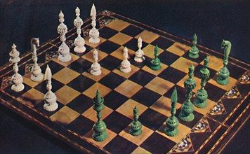 'Seventeenth-Century Ivory Chessmen and Board', 1948. Artist: Unknown.