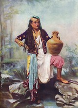 A Syrian girl at a spring, 1902. Artist: Unknown.