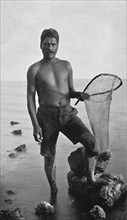A native shrimper, Hawaii, with his net, 1902. Artist: Unknown.