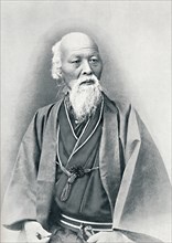 An aged Japanese doctor in full dress costume, 1902. Artist: Unknown.