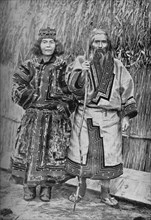 An Ainu and his wife, Japan, 1902. Artist: Kajima & Suwo.