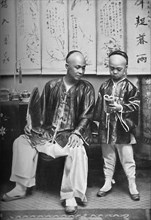 A Chinese schoolmaster and pupil, 1902. Artist: CC Pierce & Co.