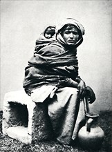 Tunisian (Berber) woman and child, 1912. Artist: J Garrigues.