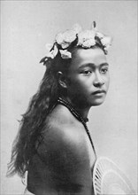 A Samoan girl, with chaplet of hibiscus flowers, 1902. Artist: Thomas Andrew.