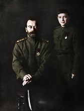 Nicholas II, Tsar of Russia and his son, Alexei, in military uniform, 1915. Artist: Unknown.