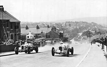 'Road racing in the Isle of Man, 1937', 1937. Artist: Unknown.