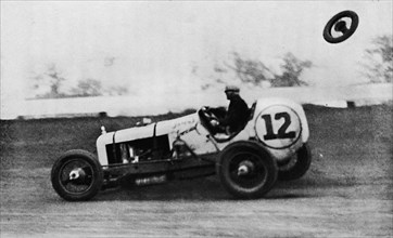 'American Speedway Racing - Jack Ericson, turning on three wheels, 1937. Artist: Unknown.